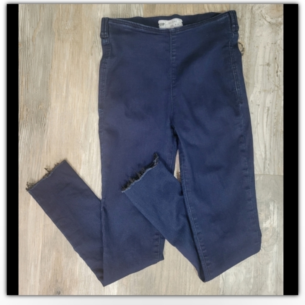 Free People skinny distressed bottom hem